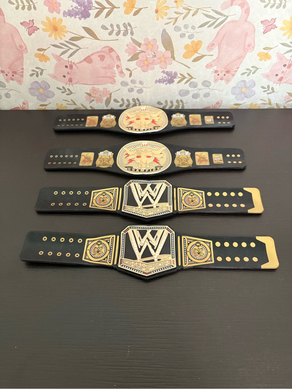 Lot of 4 WWE Slap Band championship belts bracelets. Preowned.